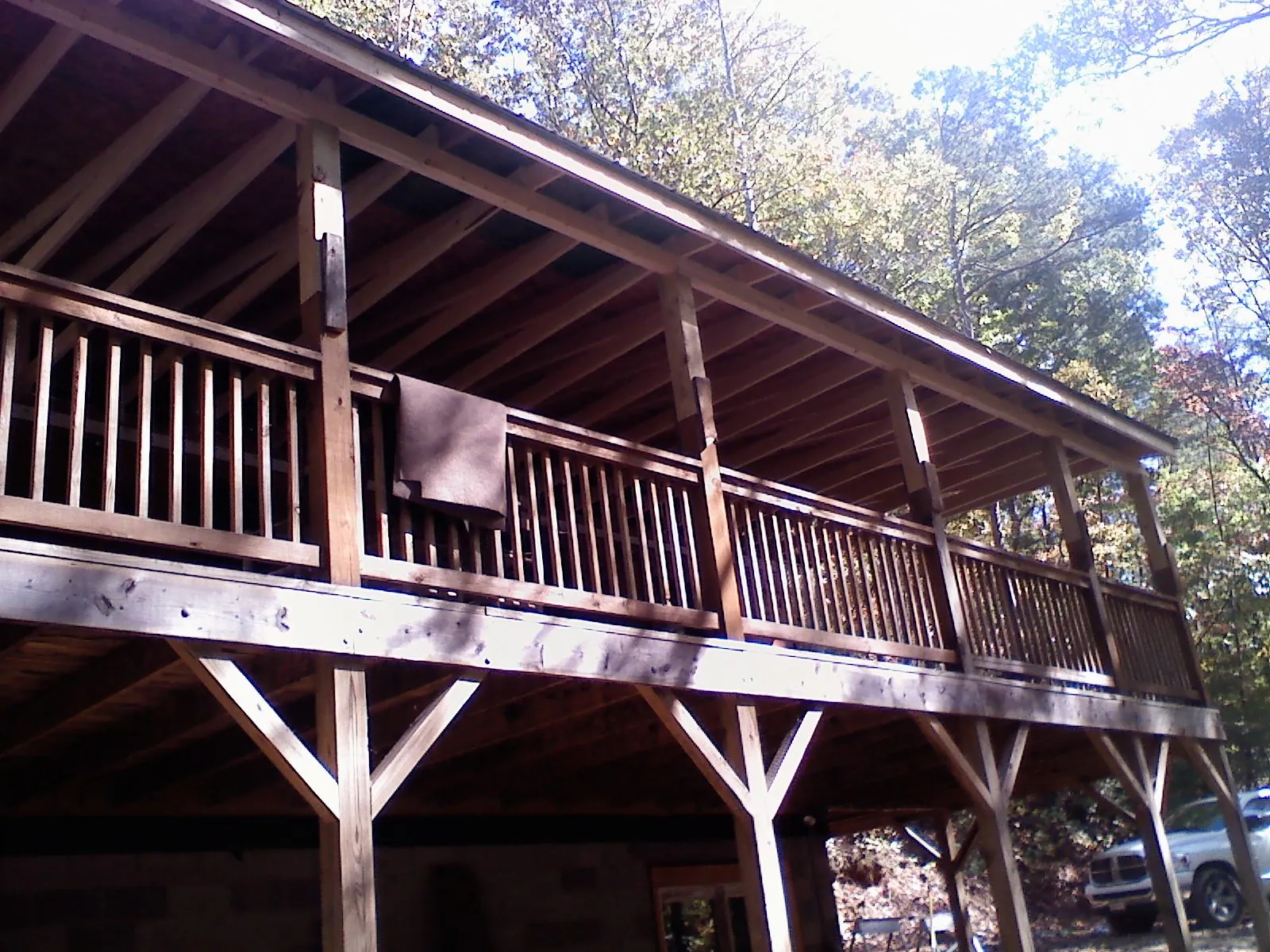 Timber framing under a new elevated porch and deck — Roof Leak Repair in Virginia by Roofing Brothers